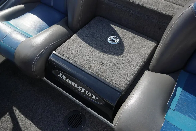 Slide: The Image of 2008 Ranger Z520 Comanche Ranger Cup boat interior with carpeted storage compartment. - 20