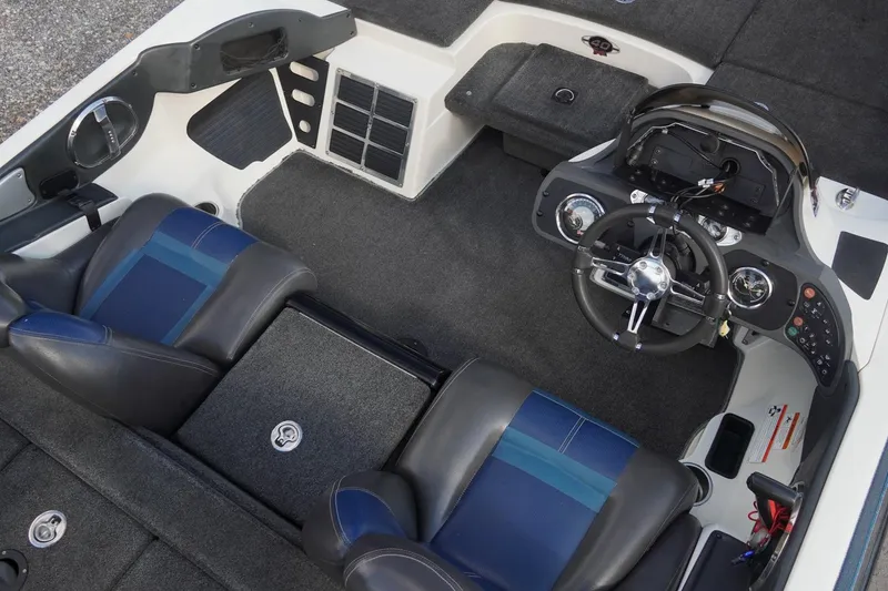 Slide: The Image of 2008 Ranger Z520 Comanche Ranger Cup boat interior with steering wheel and seating. - 24