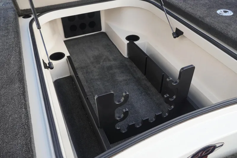 Slide: The Image of 2008 Ranger Z520 Comanche Ranger Cup boat storage compartment with rod holders. - 31