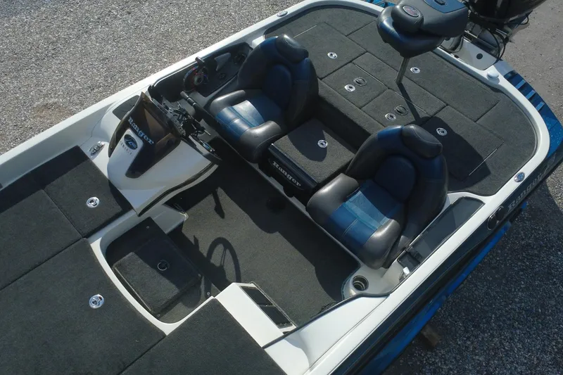Slide: The Image of 2008 Ranger Z520 Comanche Ranger Cup boat interior with dual seats and steering console. - 4