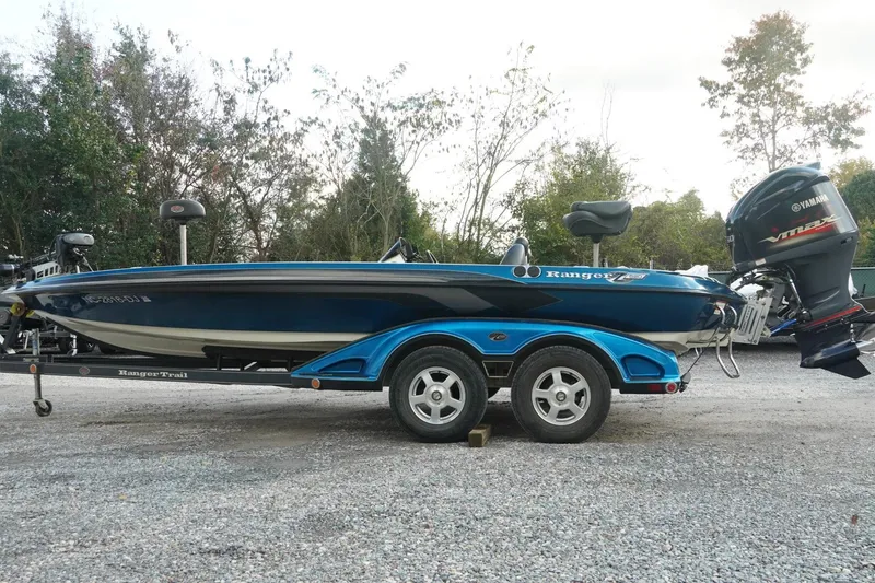 Slide: The Image of 2008 Ranger Z520 Comanche Ranger Cup boat on trailer, parked outdoors. - 40