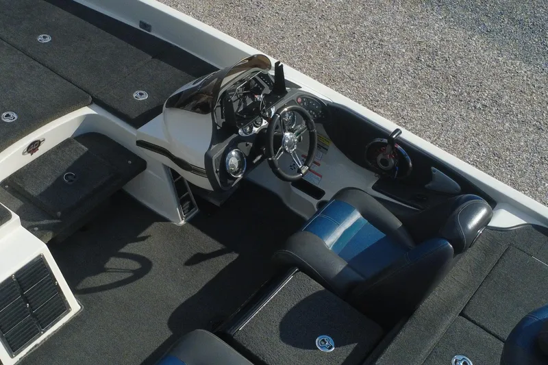 Slide: The Image of 2008 Ranger Z520 Comanche Ranger Cup boat interior with steering wheel and seating. - 5