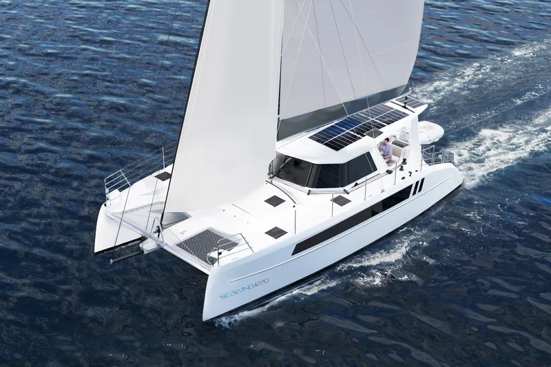 The Image of 2026 Seawind 1270 catamaran sailing on open water, featuring sleek design and solar panels. - 0