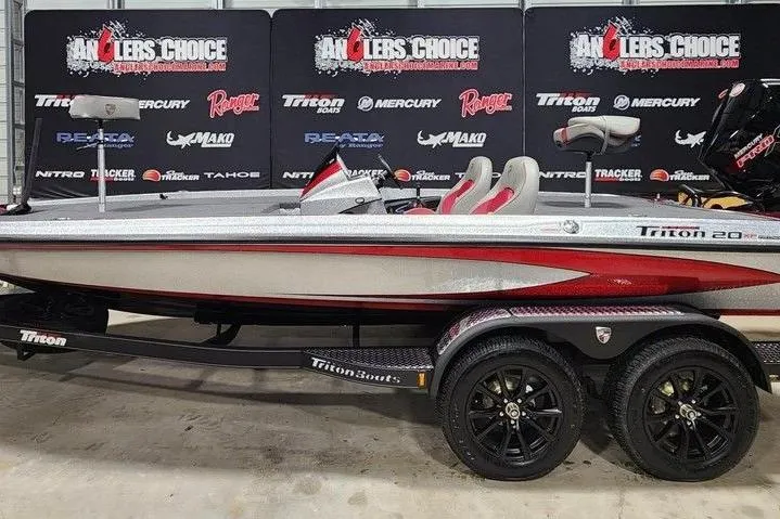 The Image of 2026 Triton 20XP Patriot boat displayed at Anglers Choice event. - 0