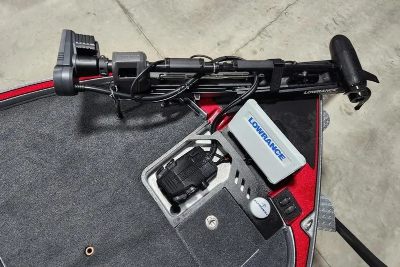 Slide: The Image of Triton 20XP Patriot 2026 boat deck with Lowrance equipment and trolling motor. - 6