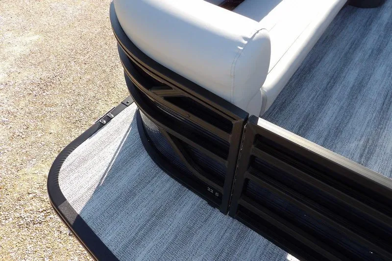 Slide: The Image of 2026 Bennington S L-Bench 22 SL pontoon boat corner with sleek design and cushioned seating. - 10