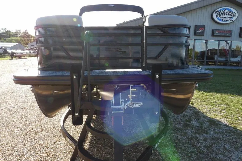 Slide: The Image of 2026 Bennington S L-Bench 22 SL pontoon boat at White's Marine Center. - 3