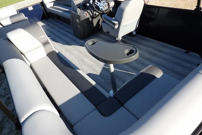 Slide: The Image of 2026 Bennington S L-Bench 22 SL pontoon boat interior with seating and steering console. - 30