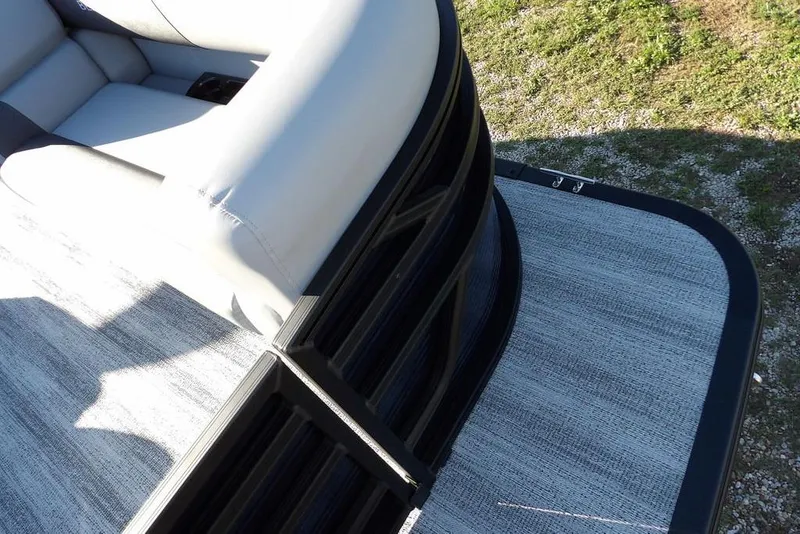 Slide: The Image of 2026 Bennington S L-Bench 22 SL pontoon boat with sleek seating and modern design. - 7