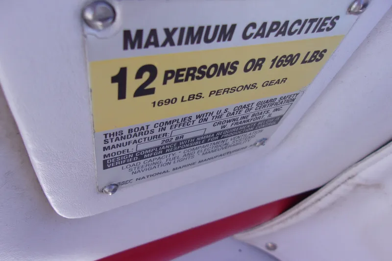 Slide: The Image of Capacity label on 2002 Crownline 202 BR boat, max 12 persons or 1690 lbs. - 15