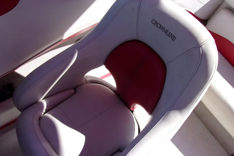 Slide: The Image of Crownline 202 BR 2002 boat seat with red and white upholstery. - 7