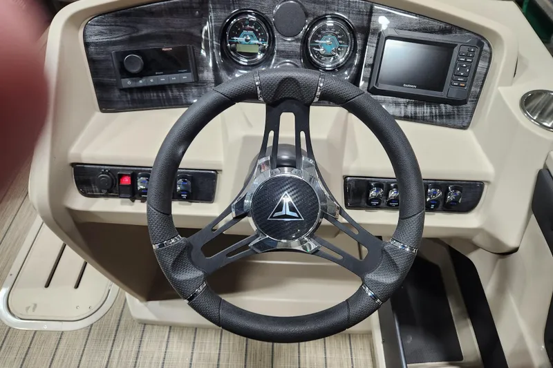 Slide: The Image of 2026 Avalon LSZ Cruise Rear Bench dashboard with steering wheel and control panel. - 11