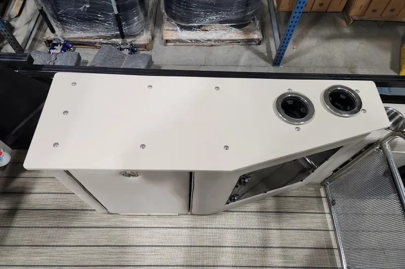 Slide: The Image of 2026 Avalon LSZ Cruise Rear Bench with storage and cup holders, viewed from above. - 13