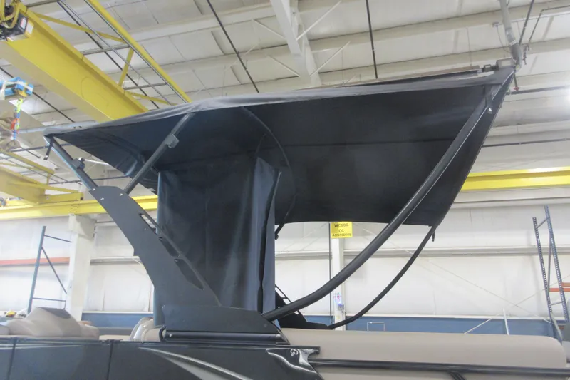 Slide: The Image of 2026 Avalon LSZ Cruise Rear Bench with extended canopy in a warehouse setting. - 18