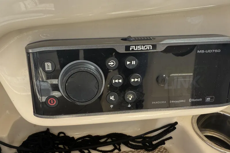 Slide: The Image of Fusion MS-UD750 audio system on 2014 Grady-White Freedom 275 boat dashboard. - 16