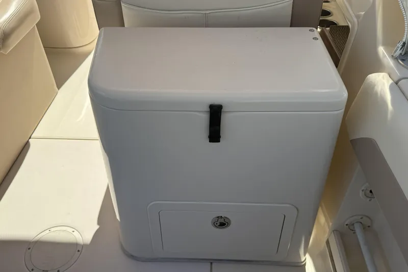 Slide: The Image of 2014 Grady-White Freedom 275 boat interior storage compartment. - 27