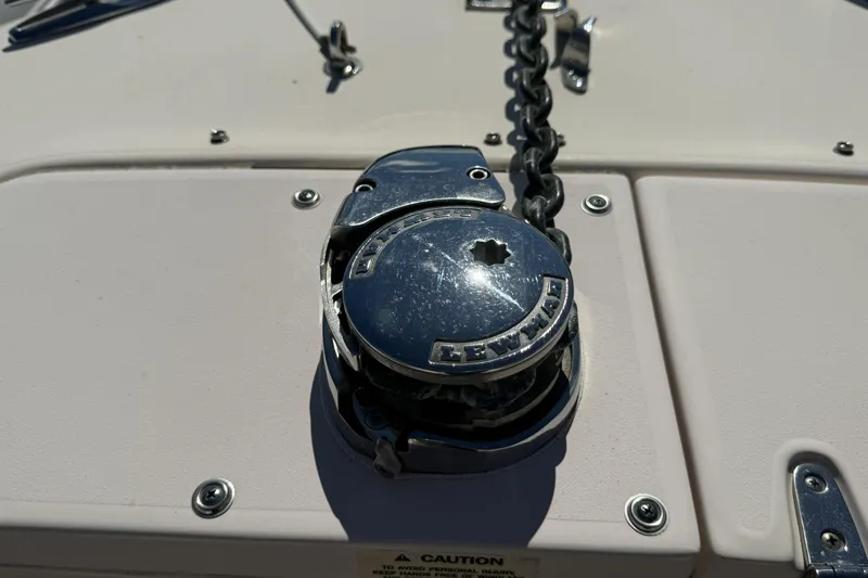 Slide: The Image of Anchor windlass on 2014 Grady-White Freedom 275 boat deck. - 36