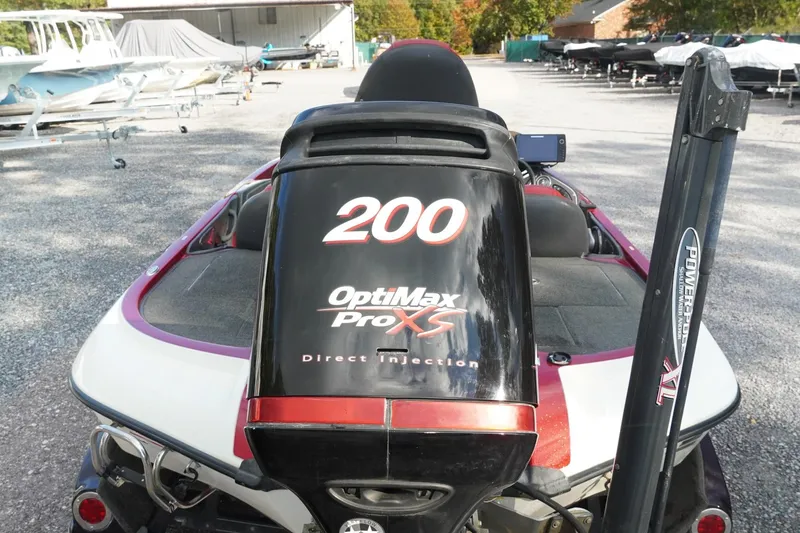 Slide: The Image of 2011 Ranger Z119 boat with OptiMax Pro XS 200 engine in a marina. - 11