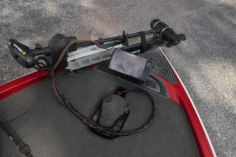 Slide: The Image of 2011 Ranger Z119 boat with Minn Kota trolling motor and fishfinder on deck. - 12