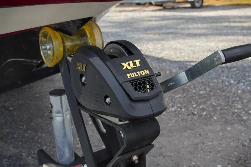 Slide: The Image of Fulton XLT winch on 2011 Ranger Z119 boat trailer, gravel background. - 30