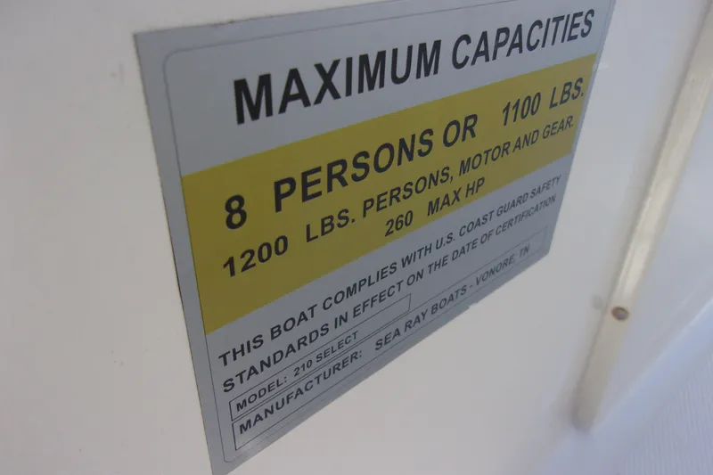 Slide: The Image of 2007 Sea Ray 210 Select capacity label, max 8 persons or 1100 lbs, 260 max HP. - 13