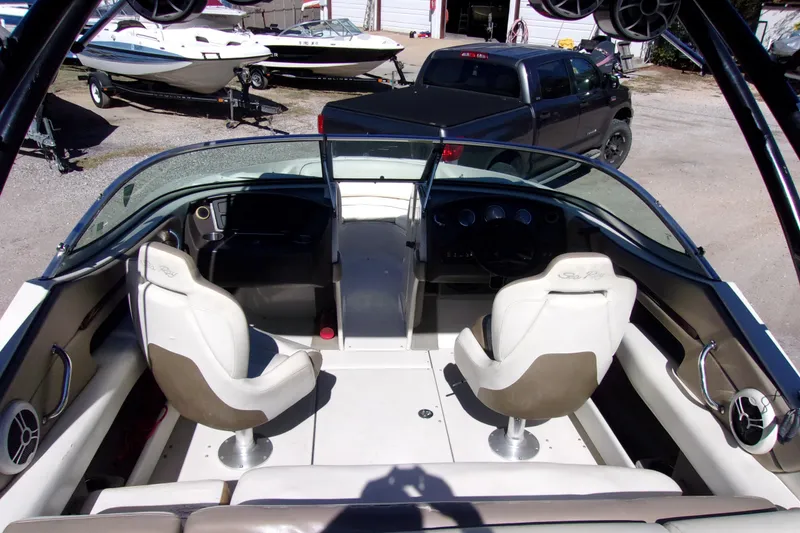 Slide: The Image of 2007 Sea Ray 210 Select boat interior with two seats and dashboard view. - 4