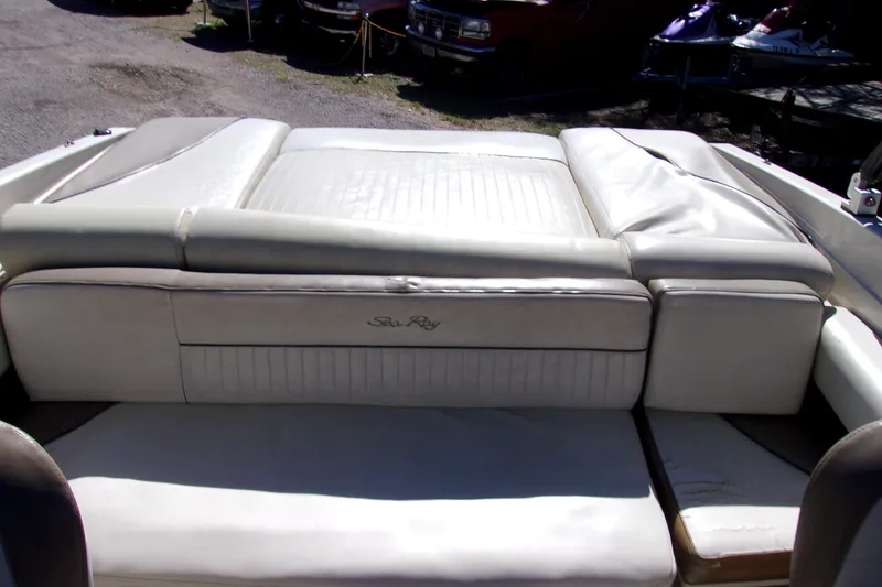 Slide: The Image of 2007 Sea Ray 210 Select boat interior with white leather seating. - 9