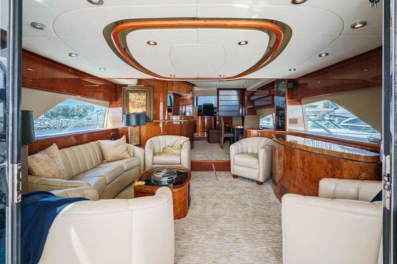 Slide: The Image of Luxurious interior of 2006 Fairline 74 Custom yacht with elegant seating and wood finishes. - 12