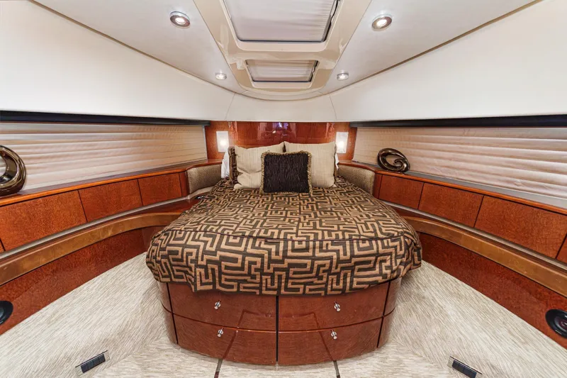 Slide: The Image of Luxurious bedroom interior of 2006 Fairline 74 Custom yacht with elegant bedding. - 34