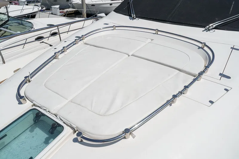 Slide: The Image of 2006 Fairline 74 Custom yacht deck with sunpad and railing. - 6