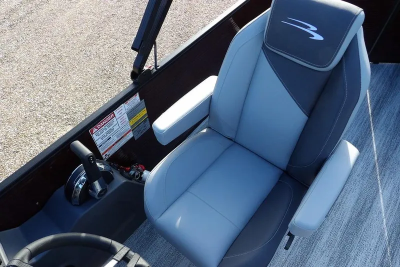 Slide: The Image of 2026 Bennington S L-Bench 22 SL boat seat with steering controls, featuring sleek design. - 27