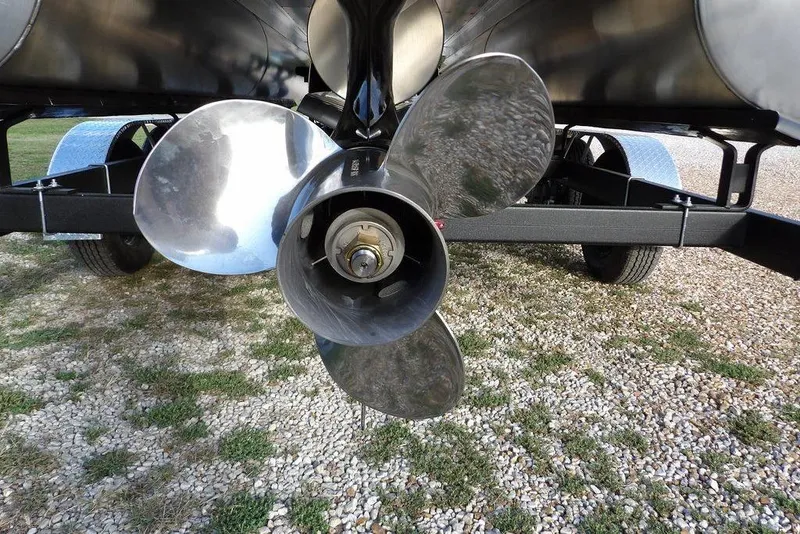 Slide: The Image of Close-up of a 2026 Bennington S L-Bench 22 SL boat propeller on a trailer. - 29