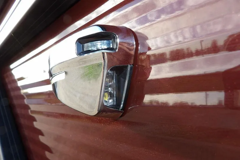 Slide: The Image of Close-up of a 2026 Bennington S L-Bench 22 SL boat handle on a glossy surface. - 36