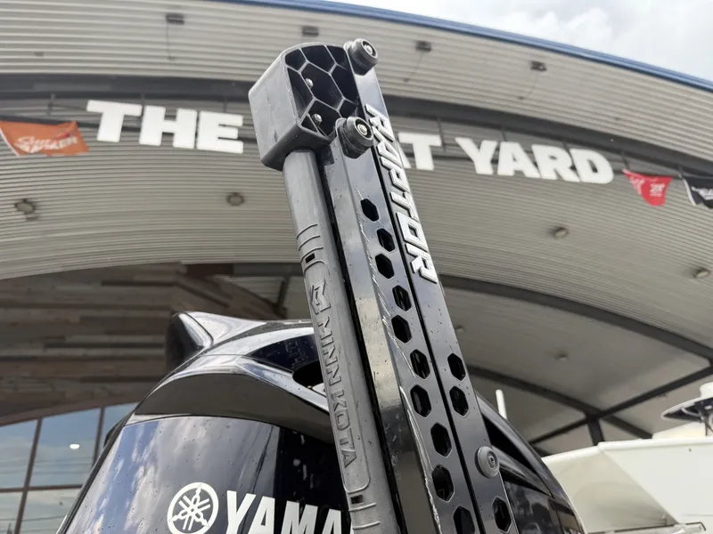 Slide: The Image of Avid 23 FS 2020 boat console with steering wheel, gauges, and navigation equipment. - 15