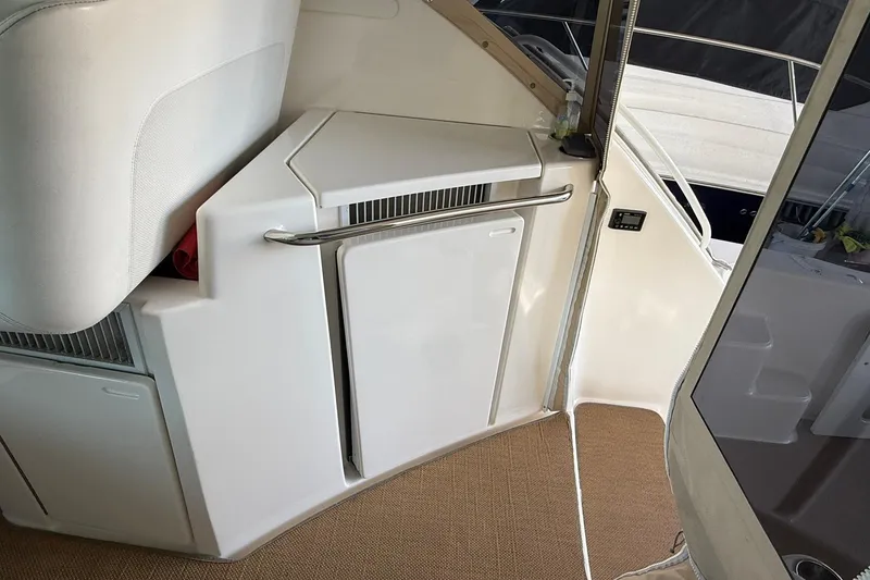 Slide: The Image of Interior view of 2011 Tiara Yachts 4500 Sovran, featuring sleek white cabinetry. - 31