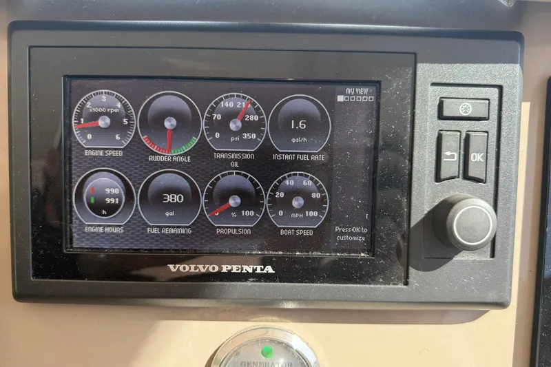Slide: The Image of Volvo Penta dashboard on 2011 Tiara Yachts 4500 Sovran, displaying engine and fuel metrics. - 39