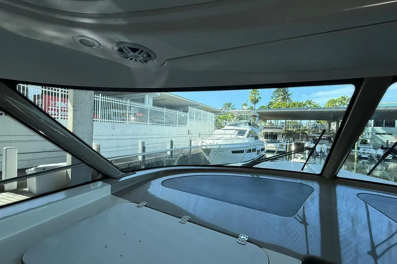 Slide: The Image of Interior view from 2011 Tiara Yachts 4500 Sovran, overlooking marina with docked boats. - 41