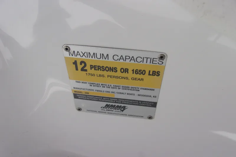 Slide: The Image of Capacity label on 2005 Cobalt 200 boat: 12 persons or 1650 lbs. - 14