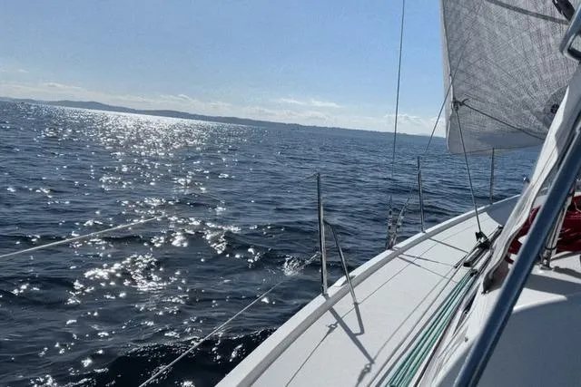 Slide: The Image of 2021 J Boats J/112E sailing on a sunny day with sparkling ocean waves. - 17