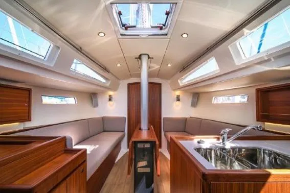 Slide: The Image of Interior of 2021 J Boats J/112E sailboat, featuring modern design and wood finishes. - 3
