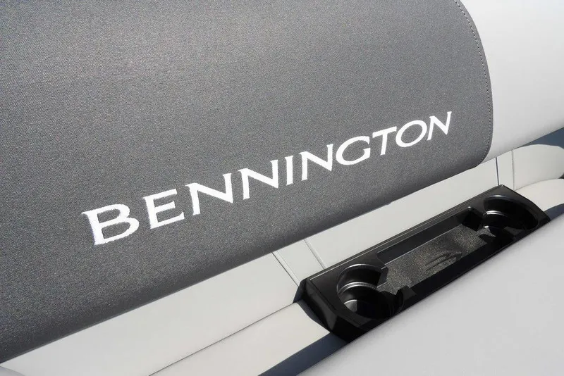 Slide: The Image of 2026 Bennington S Quad Bench 22 SSR seat with logo and cup holders. - 14