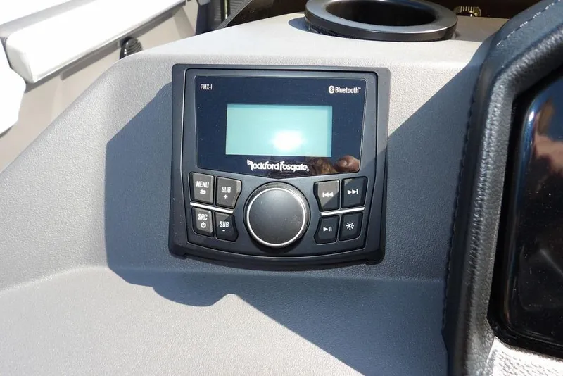 Slide: The Image of Control panel of 2026 Bennington S Quad Bench 22 SSR with Bluetooth audio system. - 26