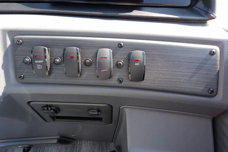 Slide: The Image of Control panel of 2026 Bennington S Quad Bench 22 SSR boat with switches. - 30