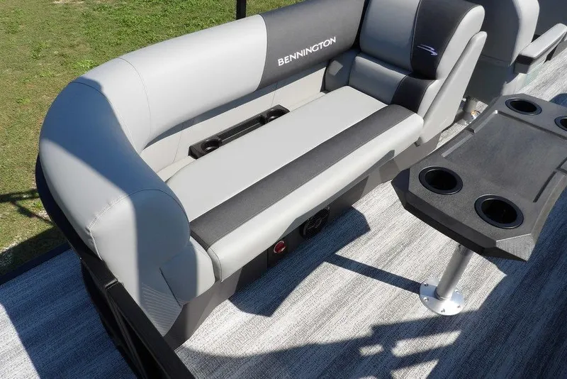 Slide: The Image of 2026 Bennington S Quad Bench 22 SSR with sleek seating and cup holders. - 33
