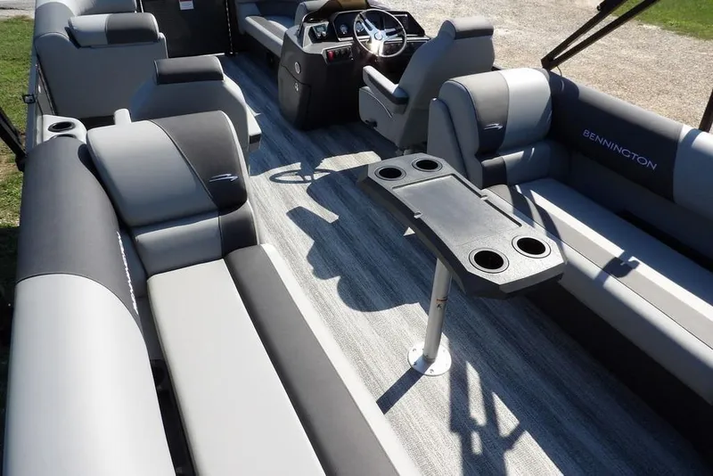 Slide: The Image of 2026 Bennington S Quad Bench 22 SSR interior with seating and table, showcasing luxury design. - 38