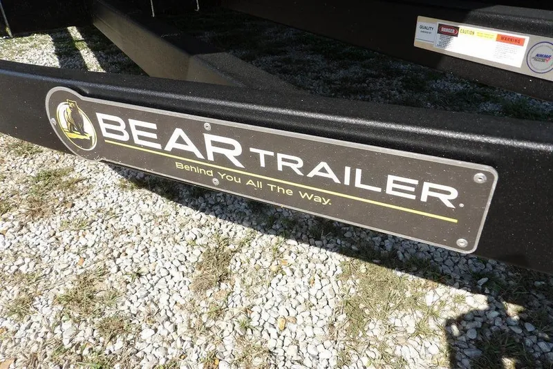 Slide: The Image of Bear Trailer logo on gravel, supporting Bennington S Quad Bench 22 SSR, 2026 model. - 42