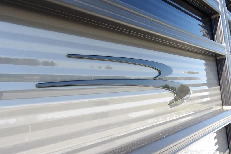 Slide: The Image of 2026 Bennington S Quad Bench 22 SSR logo on metallic surface. - 48