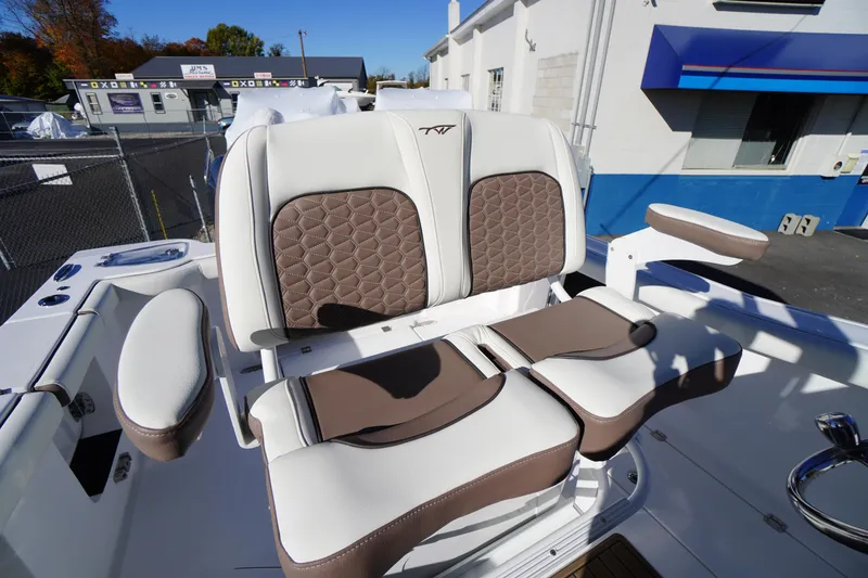 Slide: The Image of 2026 Tidewater 256 CC Adventure boat deck with custom logo mat. - 32