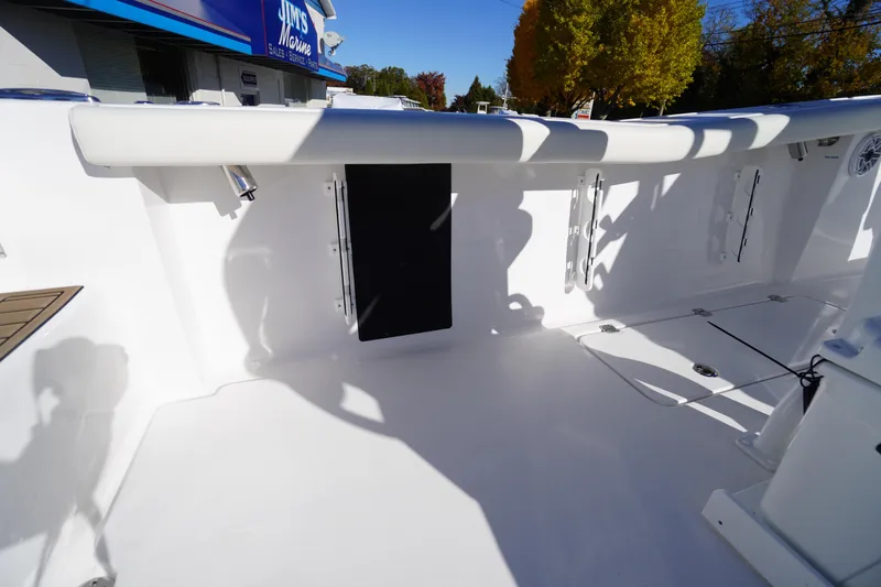 Slide: The Image of 2026 Tidewater 256 CC Adventure capacity label: 12 persons, 1900 lbs, 400 HP motor max. - 55