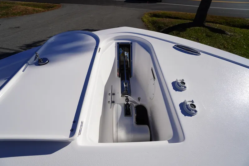 Slide: The Image of Bow deck of 2026 Tidewater 256 CC Adventure boat with hatch and fittings. - 6